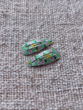 2 bloemen haarclipjes