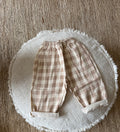 Beige geruite broek