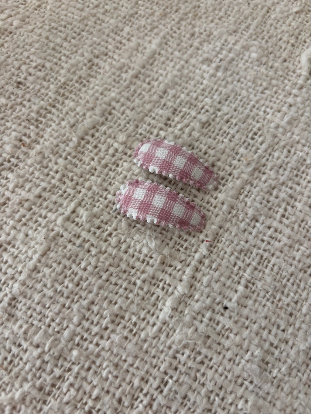 2 baby haarclipjes oudroze