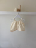 Zachte mousseline baby top met stippen