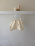 Zachte mousseline baby top met stippen