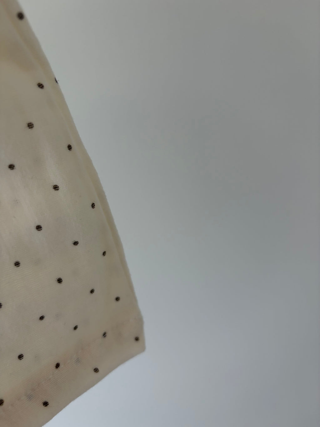 Zachte mousseline baby top met stippen