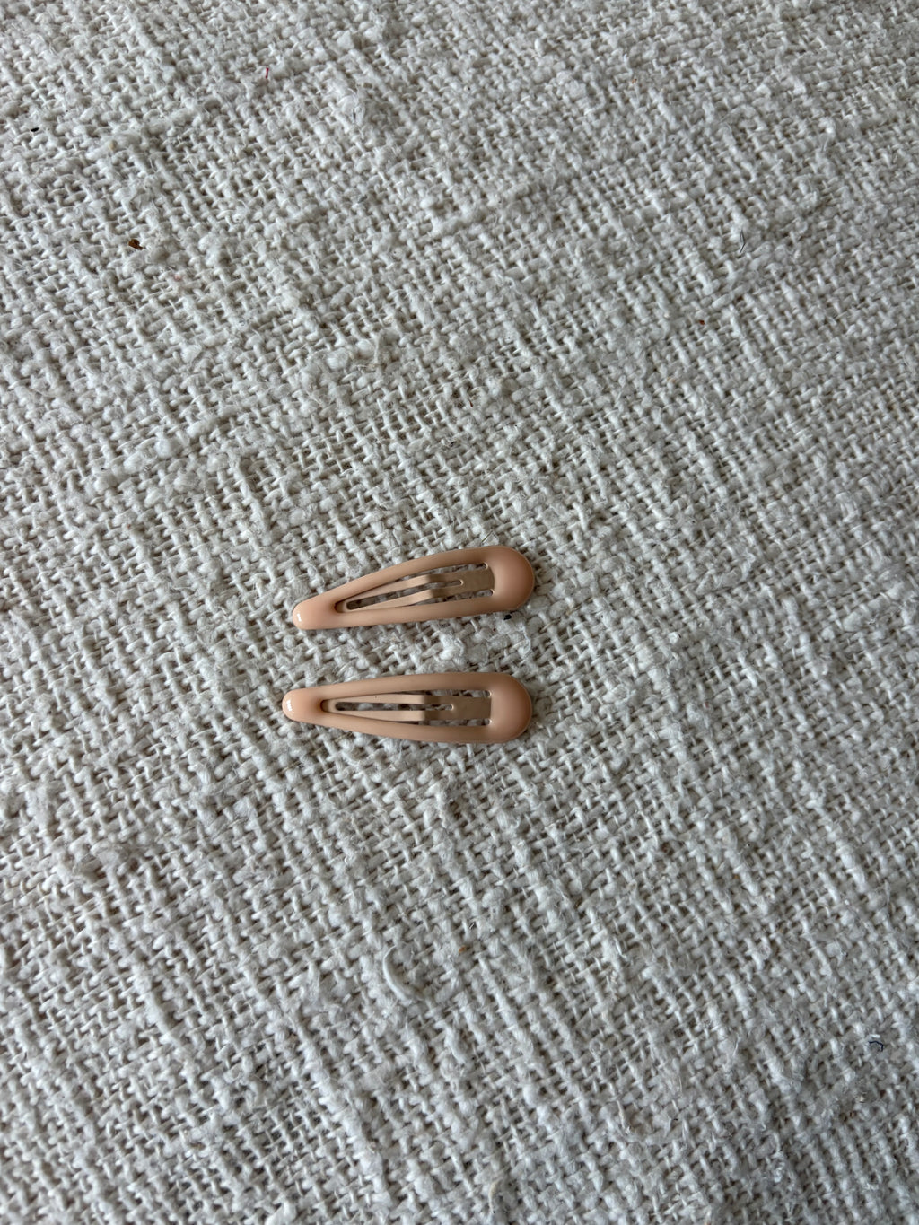 2 soft beige hair clips