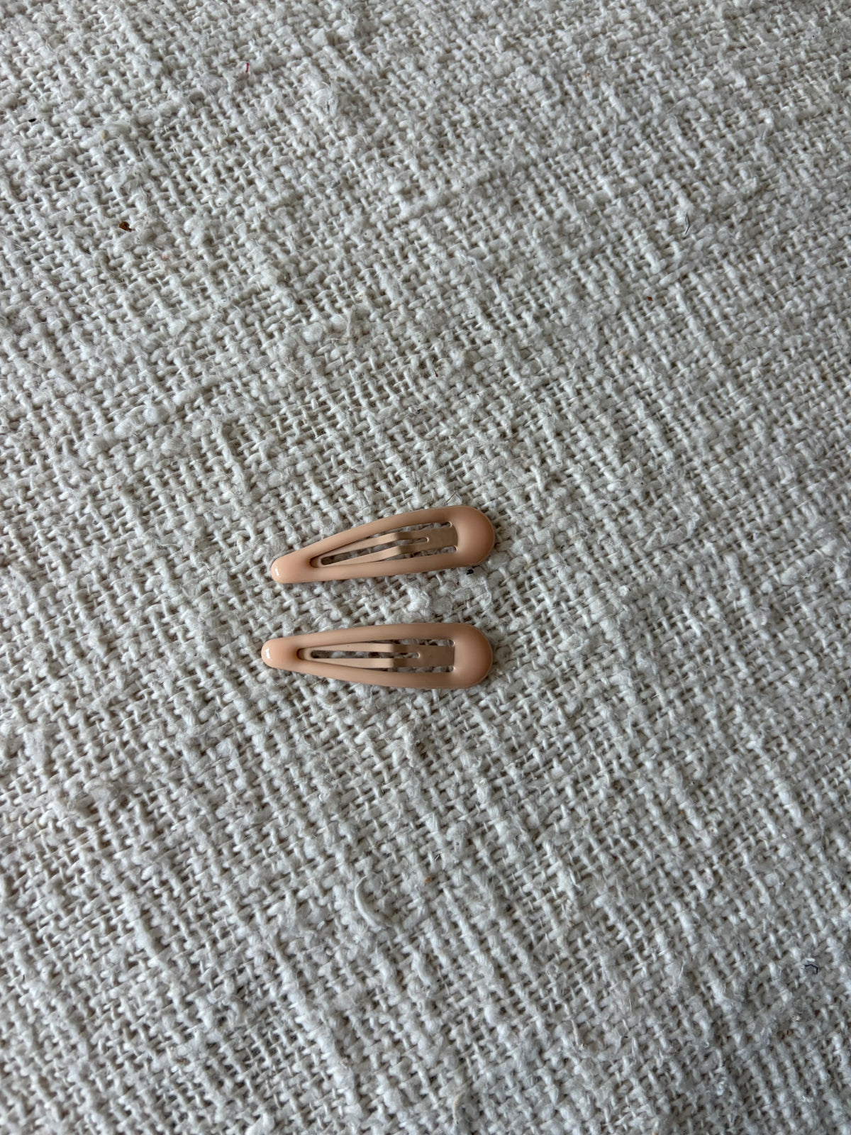 2 soft beige hair clips